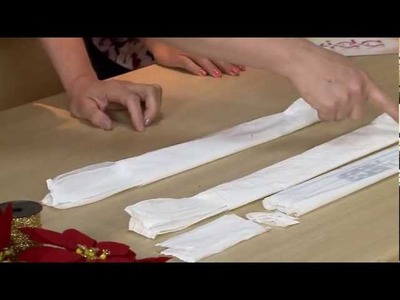 Aprenda a fazer uma guirlanda de natal com saquinhos plásticos