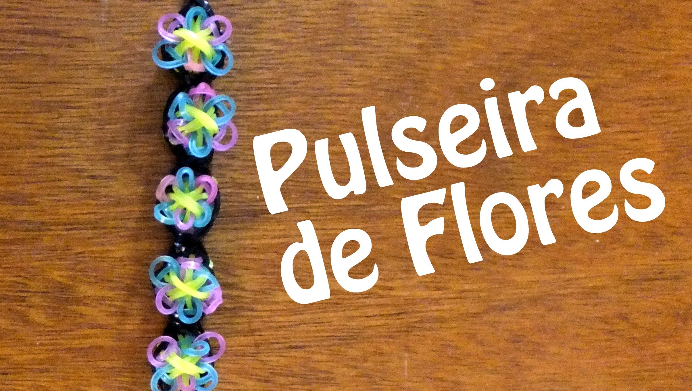 Como fazer uma pulseira de flores de elasticos rainbow loom