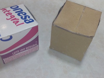 Caixa feita com caixinha de leite para dar como lembrancinha de aniversário ou de natal