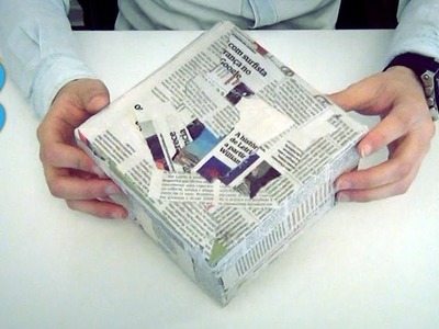 Revestir caixa com papel de jornal