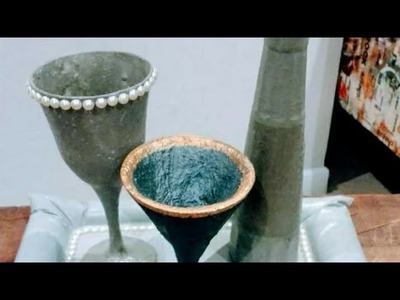 Taças e garrafas decorado  com cimento