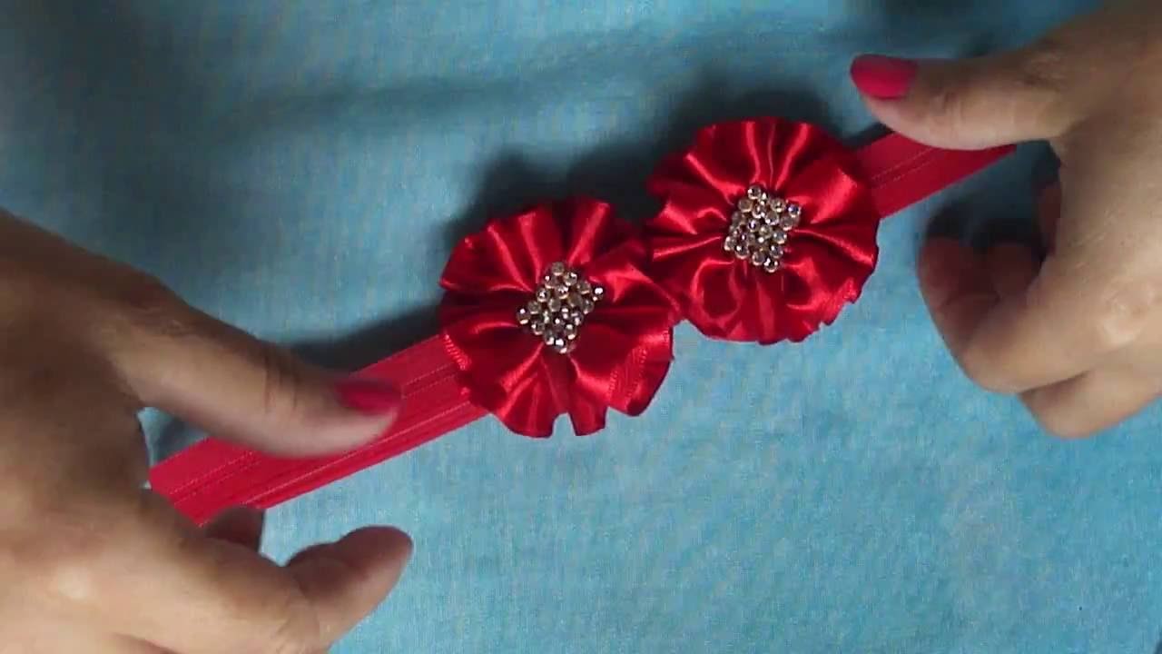 Faixa para bebê regulável.