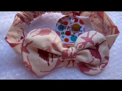 Laço de tecido na faixa para bebê