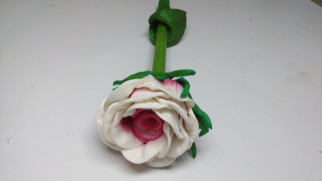 Caneta decorada com flor de eva