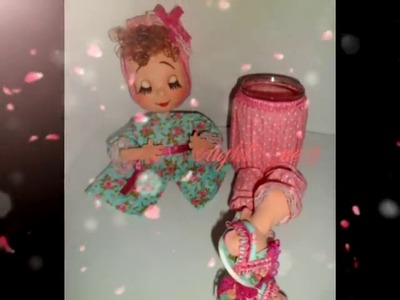 Vídeo demonstrativo boneca porta papel  higiênico no vidro.