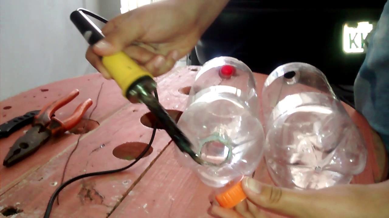 Como fazer vasos de planta na vertical com garrafas pet