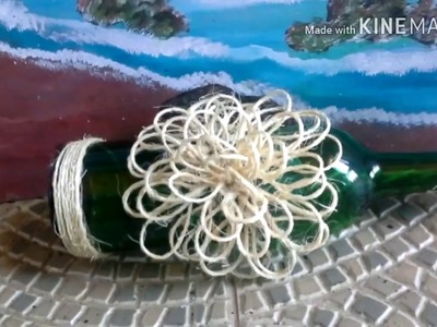 Garrafa Com flor de corda  de   sisal    sem tinta    (   passo a passo ).