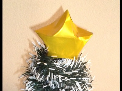 Estrela de natal feita com dobradura origami