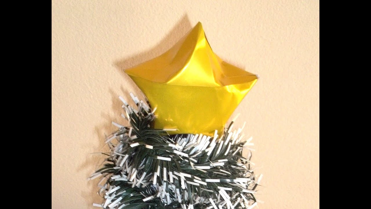 Estrela de natal feita com dobradura origami