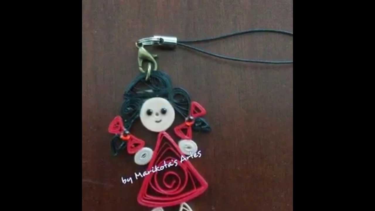 Outras artes com quilling,chaveiros e uma flor