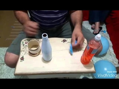 Encapando garrafa com bexiga