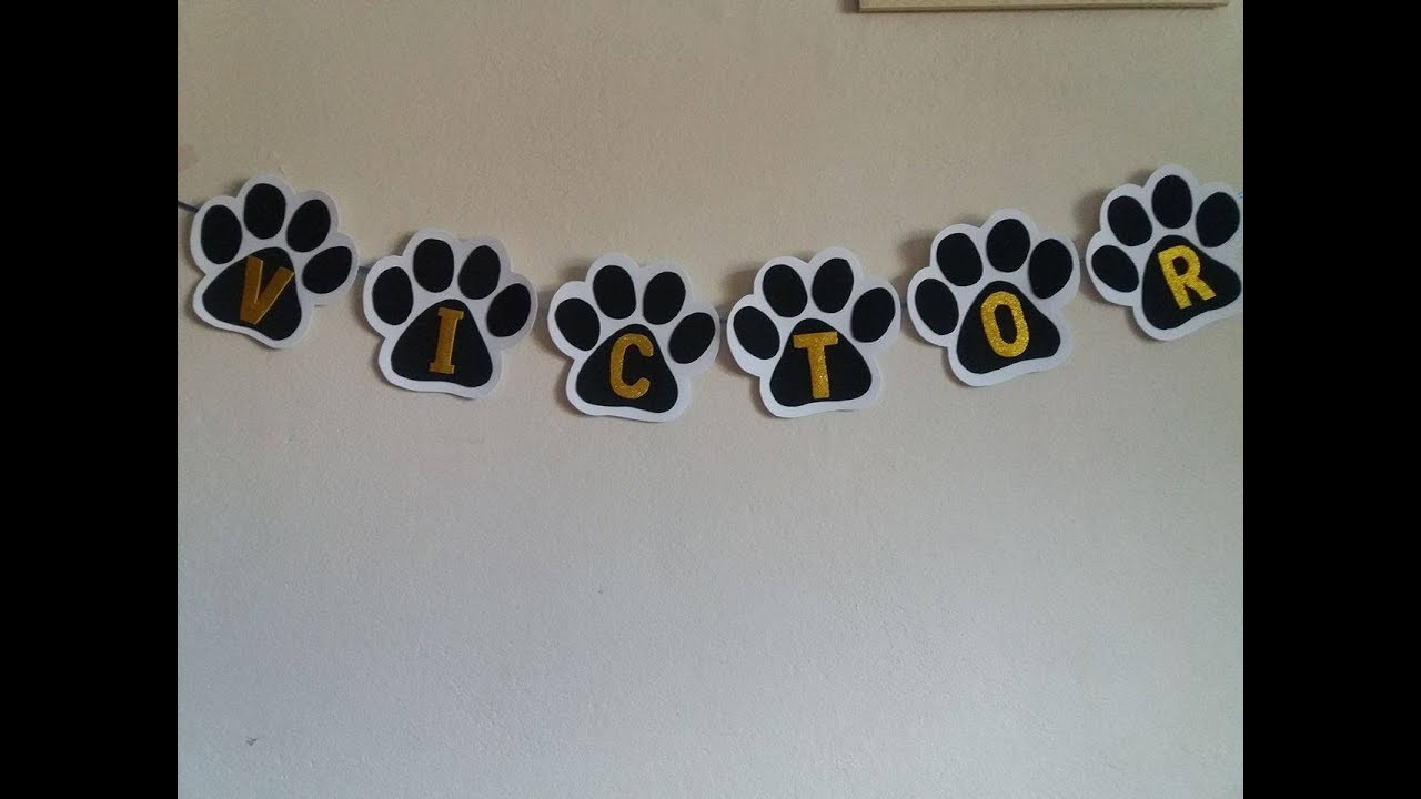 Preparativos festa patrulha canina.bandeirolas de patinhas em EVA