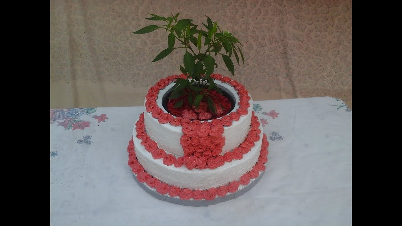 Como fazer vaso de cimento em forma de bolo de aniversario