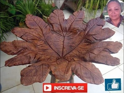 Maravilhosa folha gigante ém tecido e cimento