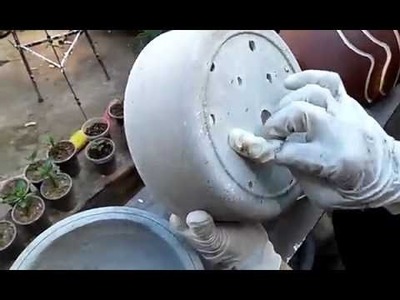 Desenformando meus vasos de cimento.