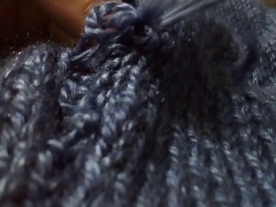 Fazendo costura invisível na lateral de blusa de tricô