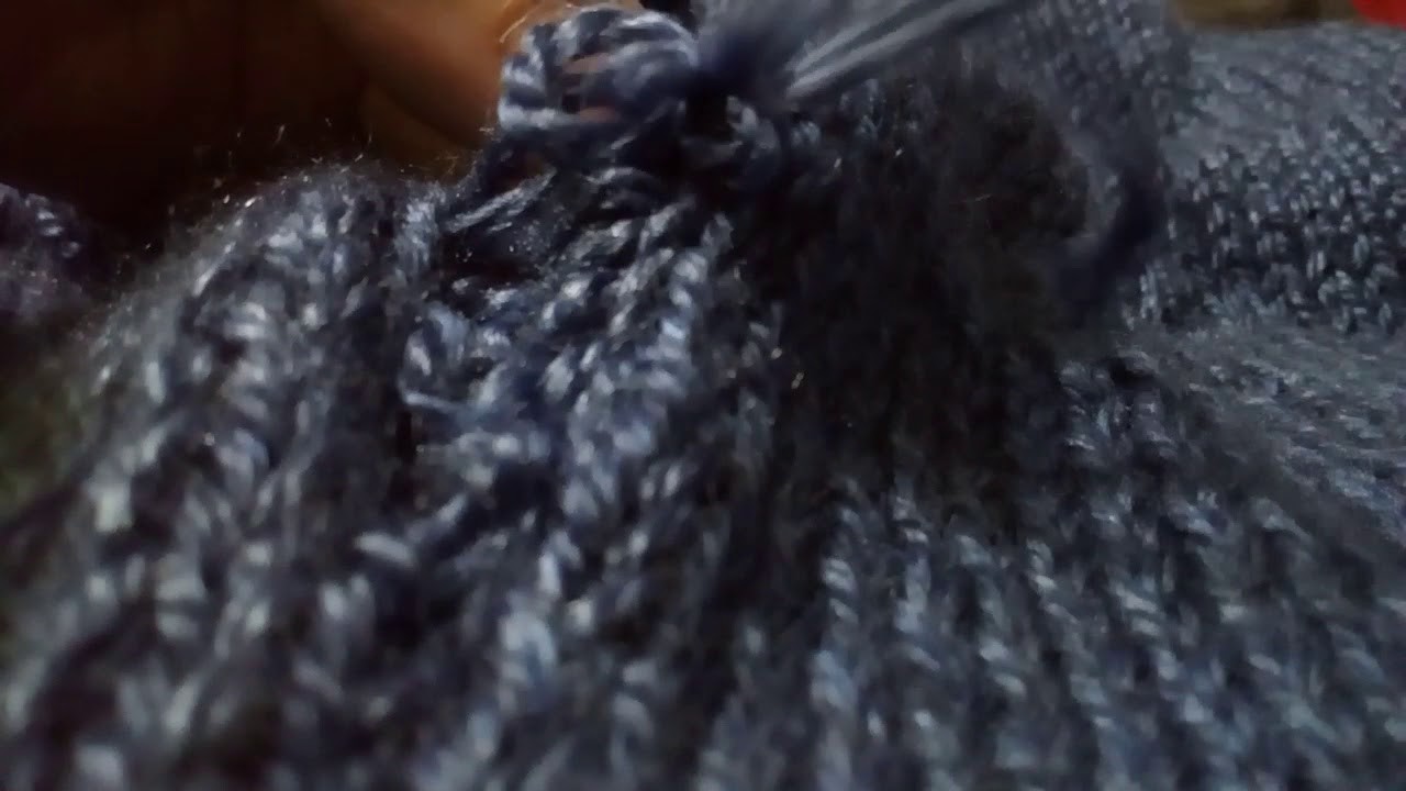 Fazendo costura invisível na lateral de blusa de tricô