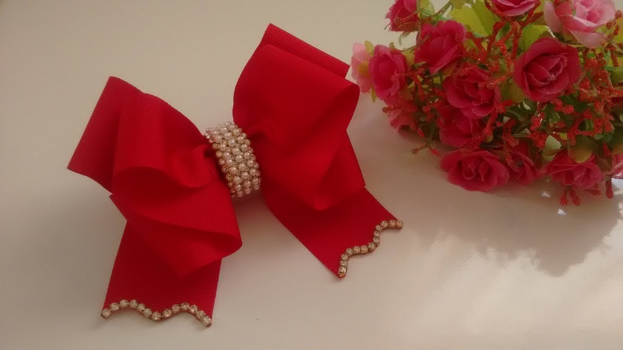 Laço Mil Faces com decoração nas pontas. DIY-PAP