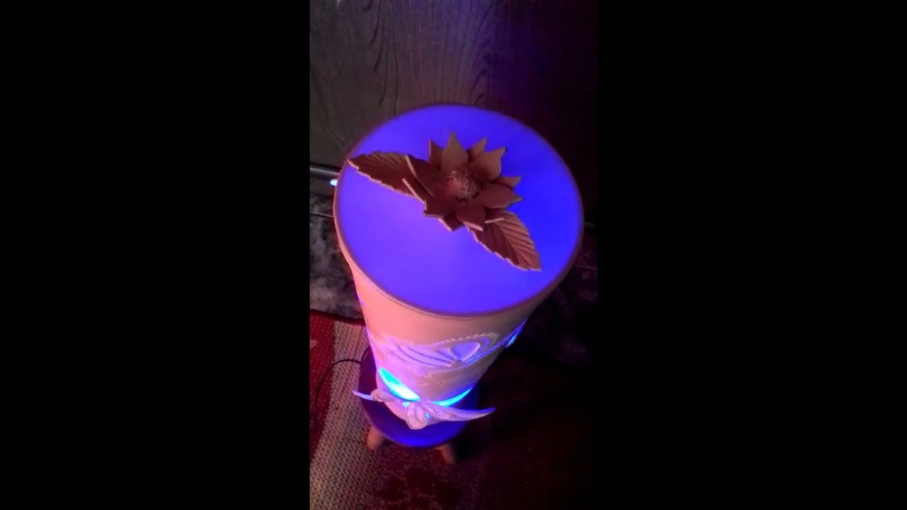 Luminária borboleta giratória