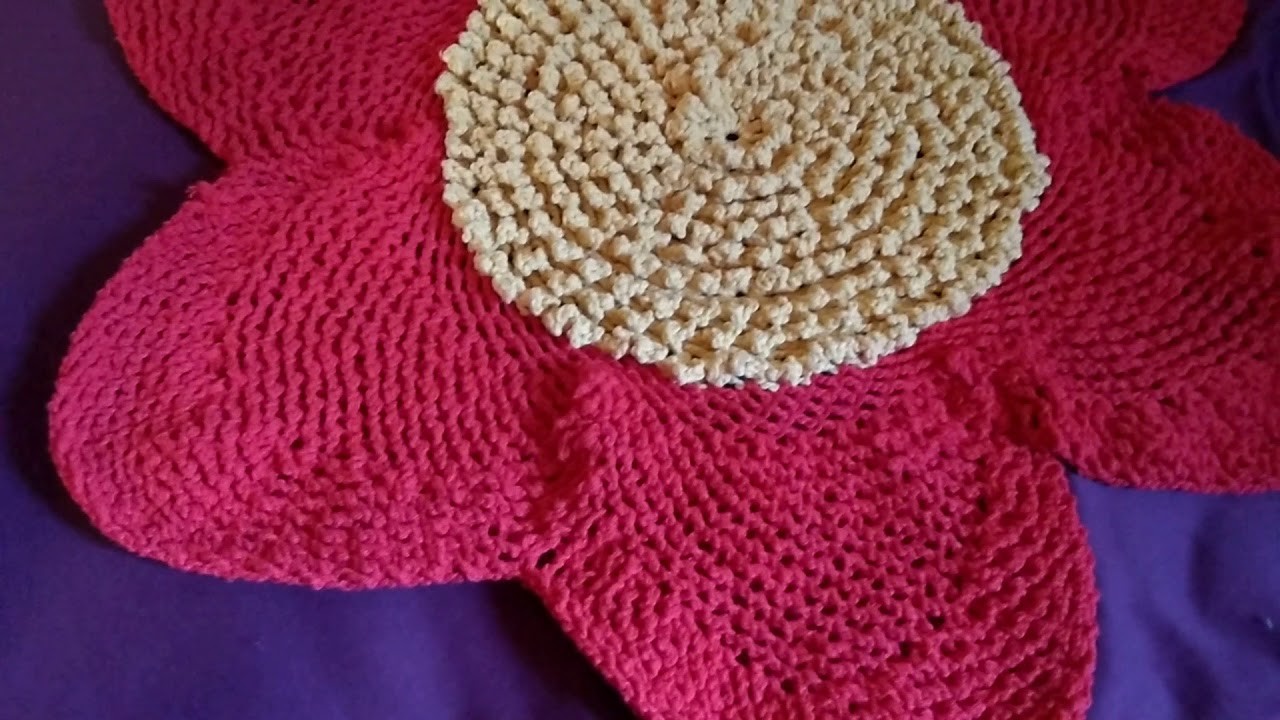 Tapete de crochê em forma de flor