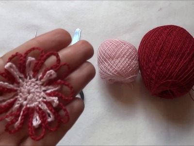 Flor rosa e vermelha de crochê (canhoto)
