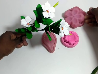 Flor de infância- vinca em Eva- Criação Jociara Santos