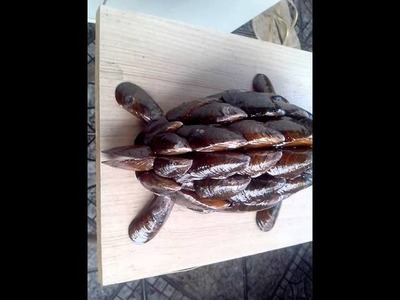 Tartaruga feita de casca de marisco
